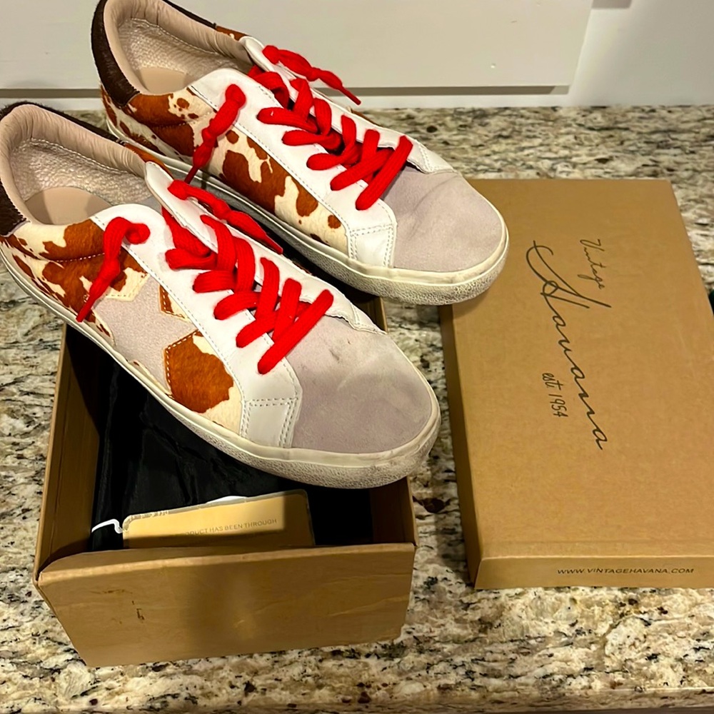 Red adds the perfect pop to these Vintage Havana sneakers